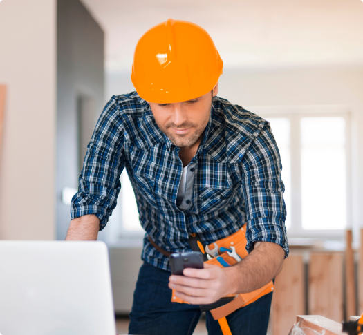 Construction worker using powertrack mobile software