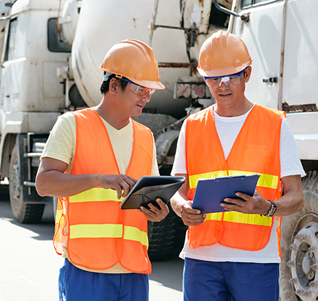 Worker using Construction Field Management Software for Labor